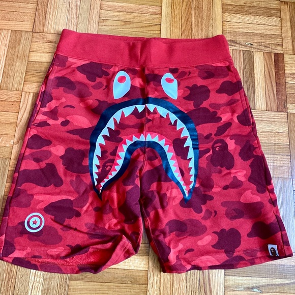 red and camo bape shorts
